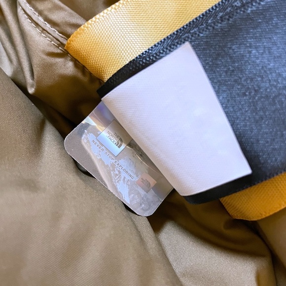 The North Face Men’s Eco Nuptse Jacket In Summit Gold Utility Brown - Picture 8 of 8